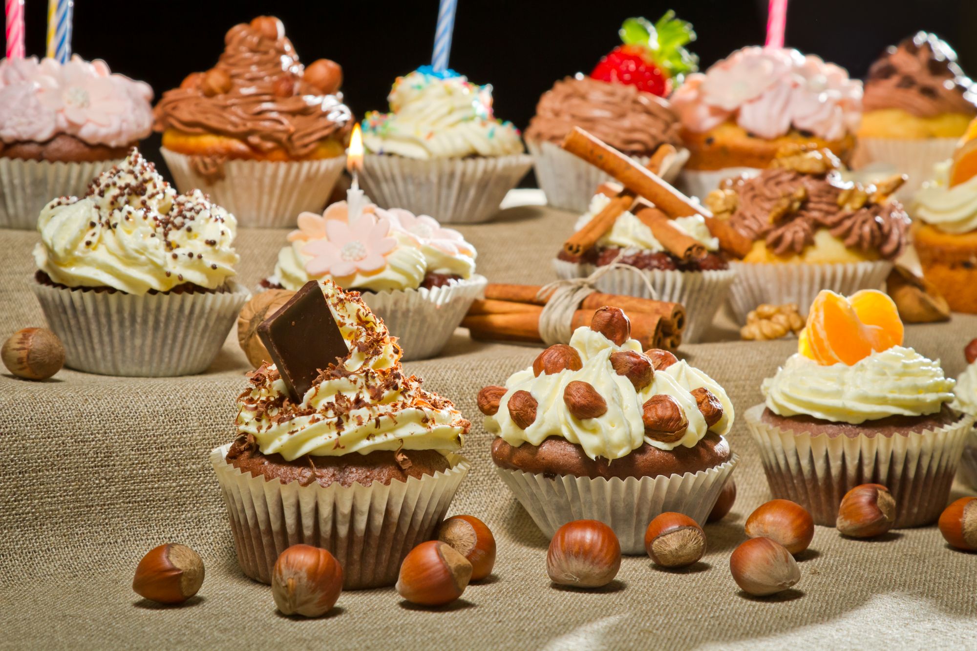 closeup-muffins-with-cream-chocolate-and-nuts-2025-03-24-03-35-00-utc